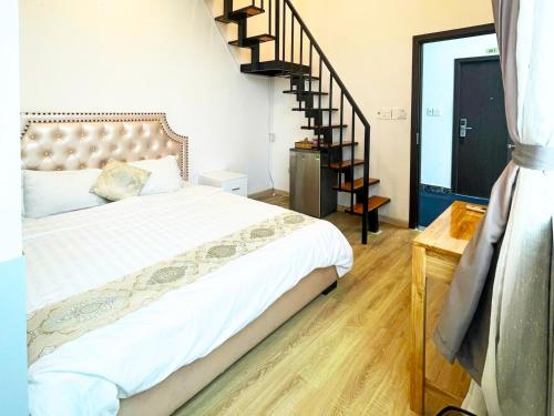Ένα ή περισσότερα κρεβάτια σε δωμάτιο στο Bighotel Can Tho