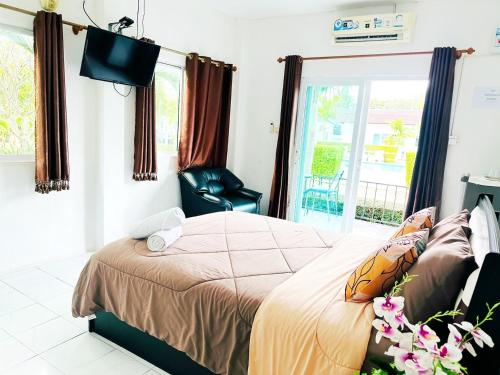 Giường trong phòng chung tại Billabong Golf Club & Resort