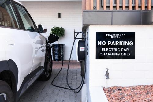 a car is parked next to a no parking sign at Powerhouse Hotel Tamworth by Rydges in Tamworth