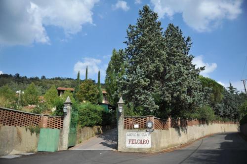 a gate to a house with a fence at Villa Felcaro - Relais, Lodge & Restaurant in Cormòns