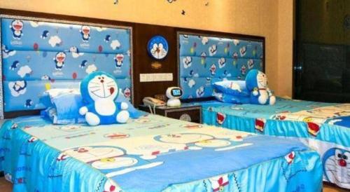 Dunhuang Dunhe Hotelにあるベッド