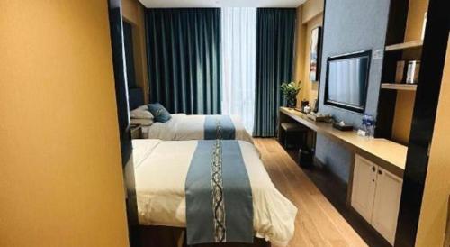 Letto o letti in una camera di Southeast Peninsula Hotel Quanzhou