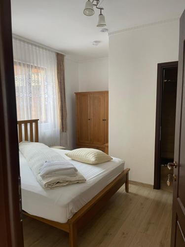 Giường trong phòng chung tại Casa Pop
