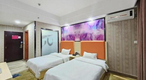Katil atau katil-katil dalam bilik di PAI Hotel·Huazhou Bus Terminal
