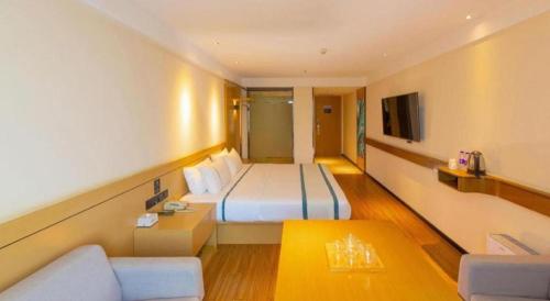TV a/nebo společenská místnost v ubytování City Comfort Inn Zhanjiang Xuwen Port Wharf Passenger Station