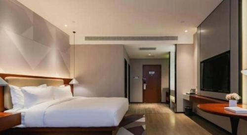 Μια τηλεόραση ή/και κέντρο ψυχαγωγίας στο Borrman Hotel Xi'an North High-speed Railway Station