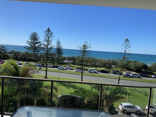 a balcony with a view of a parking lot at Meridian Alex Beach Apartments in Alexandra Headland