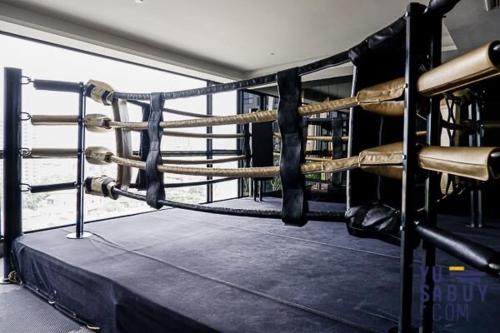 a pair of boxing rings in a room with ropes at River Cando Perfect for relaxing in Ban Sai Ma