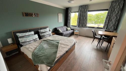 En eller flere senge i et værelse på Kleine Seemöwe