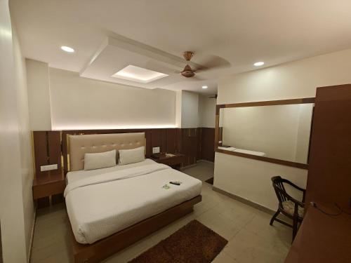 Postel nebo postele na pokoji v ubytování Hotel Apple Villa - New Delhi