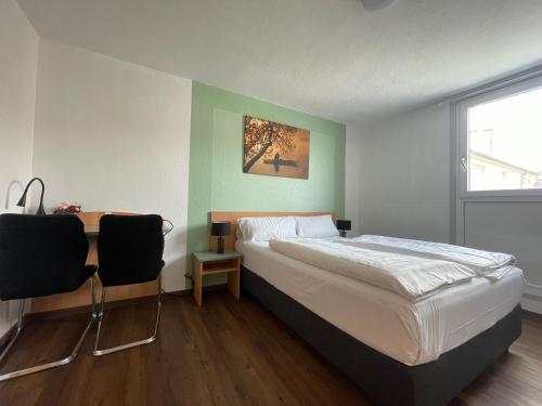 Postel nebo postele na pokoji v ubytování Residenz Hotel Wuppertal