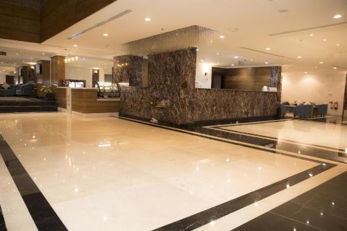 a lobby with a bowling alley in a hotel at فندق اهلا Hola Hotel in Al Jubail