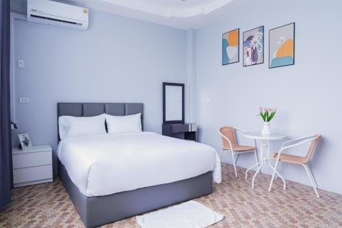 Ένα ή περισσότερα κρεβάτια σε δωμάτιο στο Lux Home
