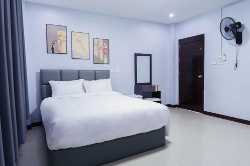 Ένα ή περισσότερα κρεβάτια σε δωμάτιο στο Lux Home