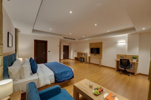 Μια τηλεόραση ή/και κέντρο ψυχαγωγίας στο Clarion Hotel De Renees Gangtok