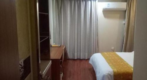 Letto o letti in una camera di GreenTree Inn Changshu South HaiYu Road Pedestrian Street Business Hotel