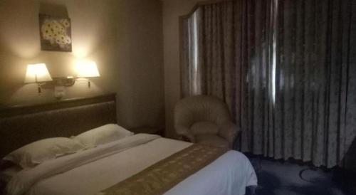 Letto o letti in una camera di GreenTree Inn Changshu South HaiYu Road Pedestrian Street Business Hotel