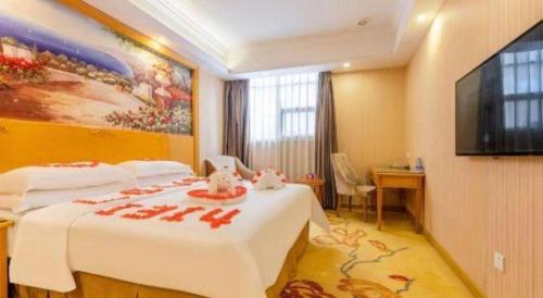 Letto o letti in una camera di Vienna 3 Best Hotel Shenzhen Bantian Guangya Park Metro Station