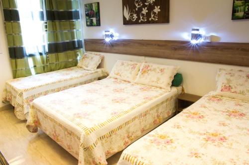 Tempat tidur dalam kamar di Alto Estilo Leme Copacabana