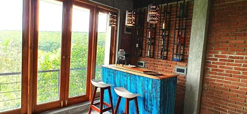 Edgefield Residence & Escapesにあるキッチンまたは簡易キッチン