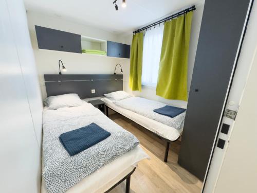 Ένα ή περισσότερα κρεβάτια σε δωμάτιο στο Mobile Home