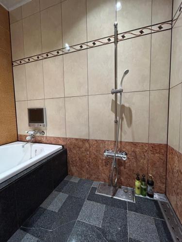 Koupelna v ubytování Hotel Takao Asile