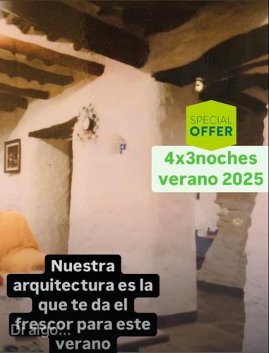 a sign that is on a wall in a room at Apartamento El Refugio de Mecina in Mecina Fondales