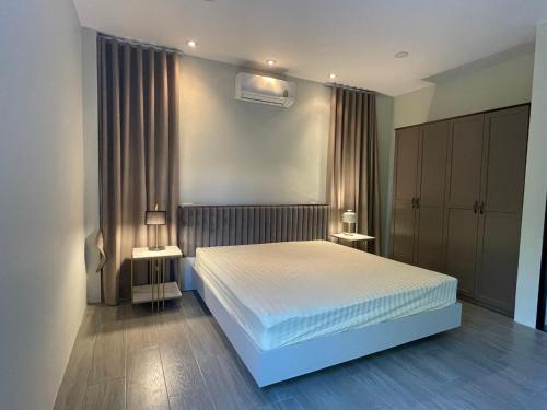 Postel nebo postele na pokoji v ubytování Pool Villa 3 bedroom