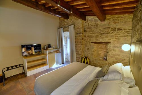 Postel nebo postele na pokoji v ubytování Rooms in Spello