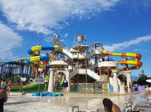 a water slide at a water park at Domaine Les feuilles de Chêne in Carpentras