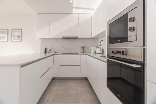 Η κουζίνα ή μικρή κουζίνα στο Caminho Real Guest Apartment II