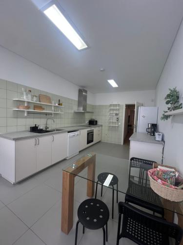 Küche/Küchenzeile in der Unterkunft Casa da Joana T2 no Centro Histórico de Angra