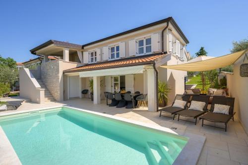 Πισίνα στο ή κοντά στο Villa Nala