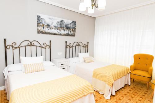 Postel nebo postele na pokoji v ubytování Casa Papín