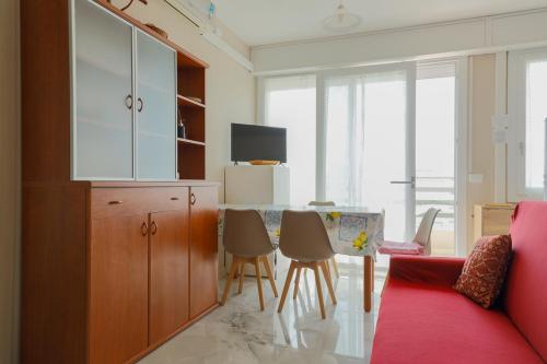TV a/nebo společenská místnost v ubytování {Lux Kobler} - Luminoso Appartamento Fronte mare