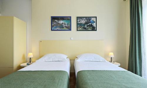 Postel nebo postele na pokoji v ubytování Hotel Rajna