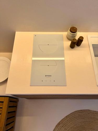 a white box sitting on top of a counter at Conte Mykonos II in Aggelika