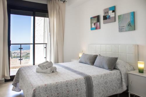 Katil atau katil-katil dalam bilik di Apartamentos & SPA Torres de San Juan