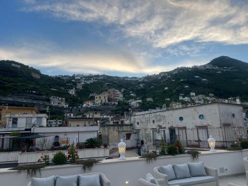 a view of a city from the balcony of a building at Minori Palace in Minori