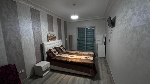 En eller flere senge i et værelse på La Siesta Beach Resort