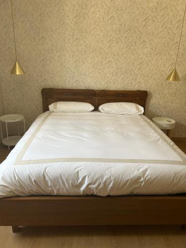 Letto o letti in una camera di BelAbrì - central charme&comfort -mansarde e appartamento