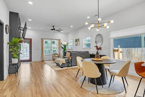 a living room with a table and chairs at Stylish Bungalow Near BeltLine & Breweries bungalow in Atlanta