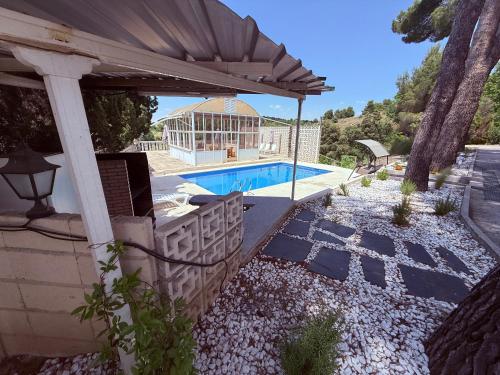 Πισίνα στο ή κοντά στο Luxury Villa con piscina y tenis privados PLUS