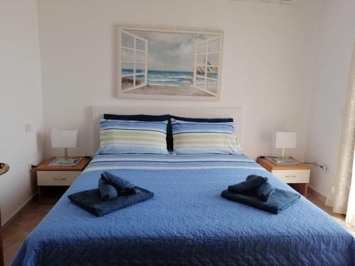 Postel nebo postele na pokoji v ubytování Moys apartment sea view olbia