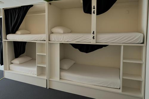 Μία ή περισσότερες κουκέτες σε δωμάτιο στο NAP v