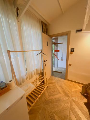 a room with a spiral staircase in a house at Mogla Tashan Hotel in Muğla