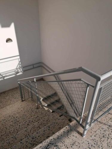 a shopping cart in a corner of a room at Platanistasa Agro homes in Platanistasa