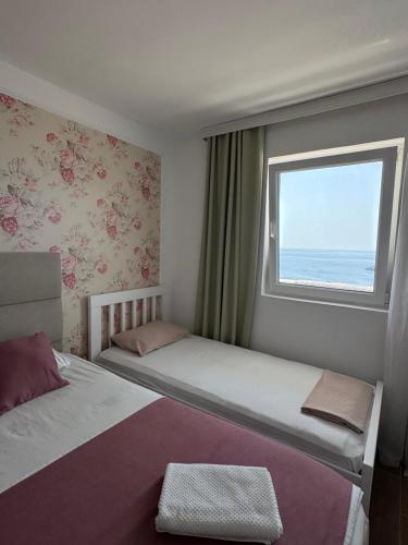 Un ou plusieurs lits dans un hébergement de l'établissement Pine&Sea Beach Retreat