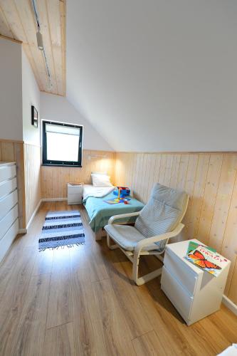 Posedenie v ubytovaní Wytwórnia Ciszy i Spokoju Apartamenty Wojtokiemie