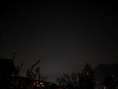 a starry night with a dark sky at Shivadya - A Luxury Boutique Experience in Manāli